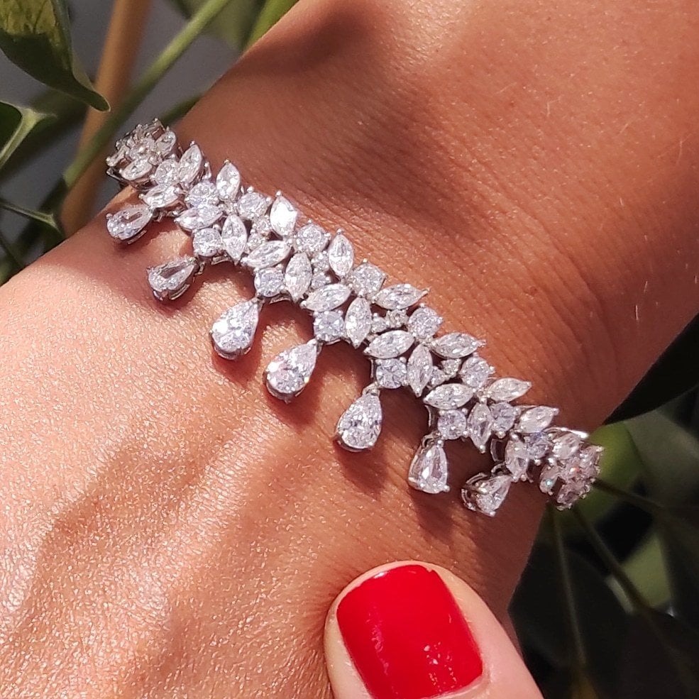 SWAROVSKİ TAŞLI ALTIN KAPLAMALI İTHAL GÜMÜŞ  BİLEKLİK