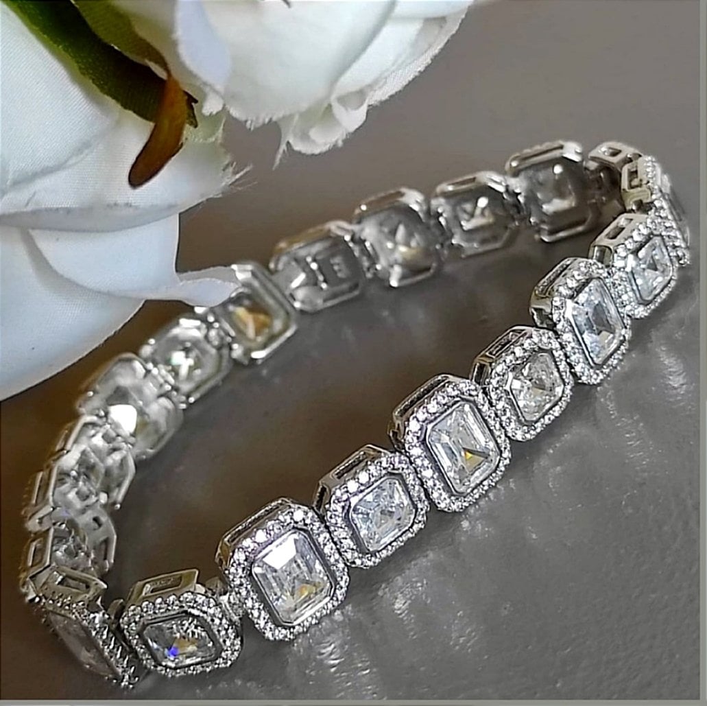 SWAROVSKİ TAŞLI ALTIN KAPLAMALI KALIN SUYOLU GÜMÜŞ BİLEKLİK